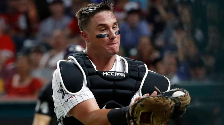 James McCann of the White Sox catches pop up in foul territory...
