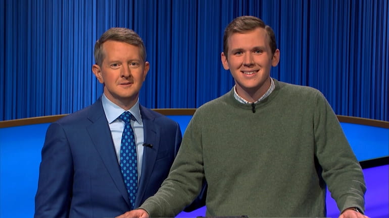 Former Long Islander Sean McShane, right, with "Jeopardy!" host Ken Jennings during...