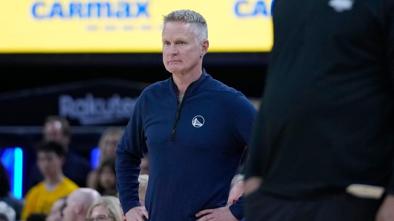 Golden State Warriors coach Steve Kerr watches during the second...