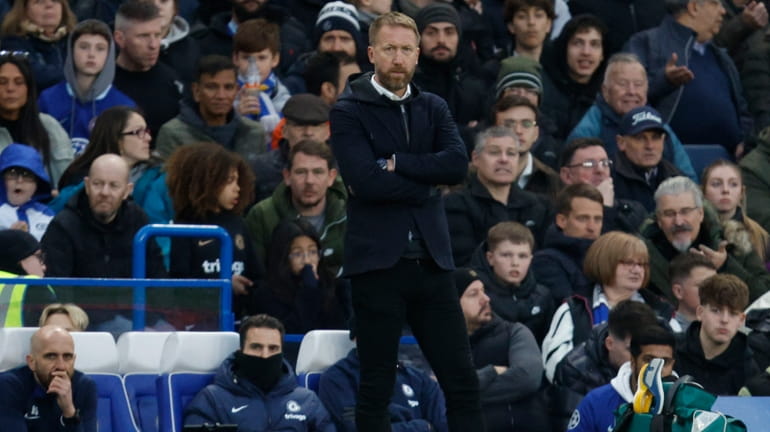 Chelsea's head coach Graham Potter, follows the game during the...