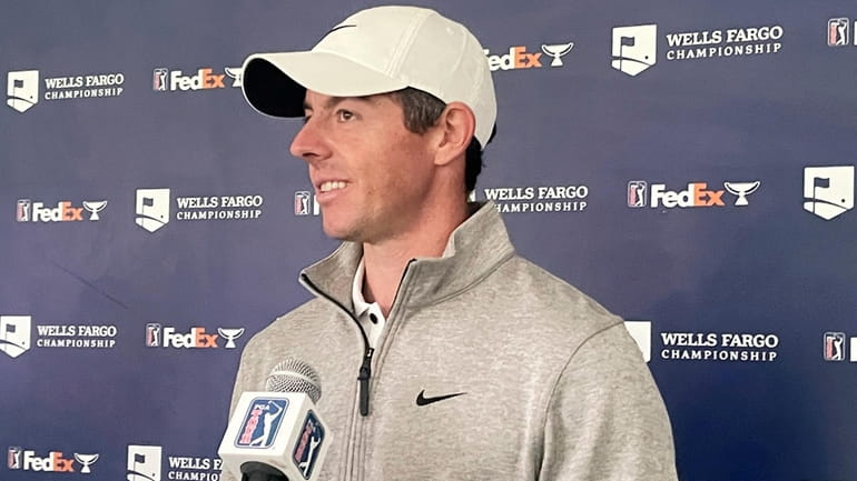 Rory McIlroy speaks to reporters at the Wells Fargo Championship...