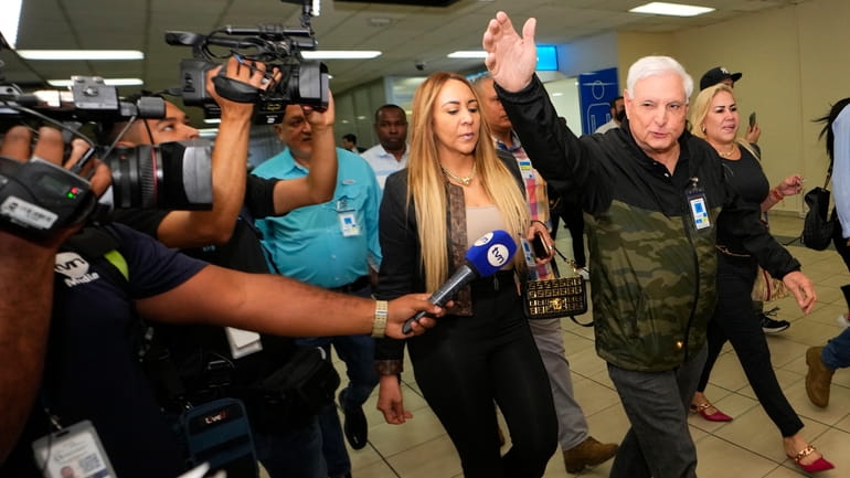 Former Panamanian President Ricardo Martinelli walks in Tocumen International Airport,...
