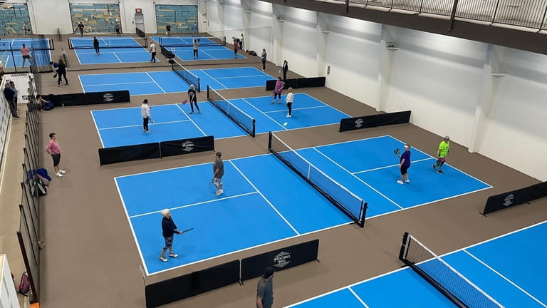 The Pickleball Hall, new to Sayville, features seven courts for...