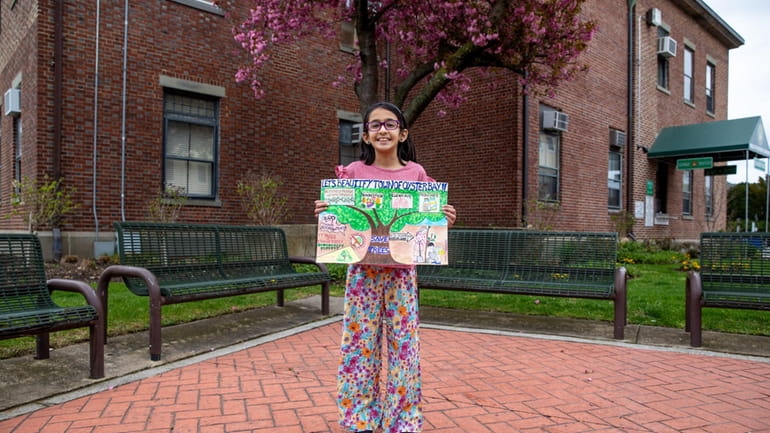 Oyster Bay fourth-grade poster contest winner Shanaya Shah, 9, a...