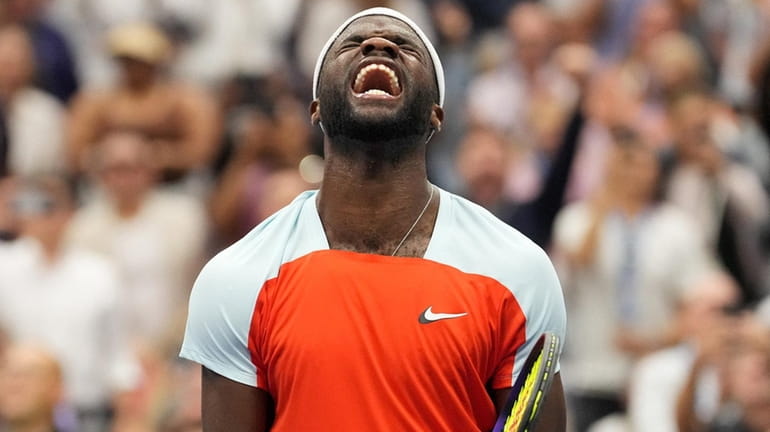 Frances Tiafoe celebrates after defeating Andrey Rublev in the U.S....