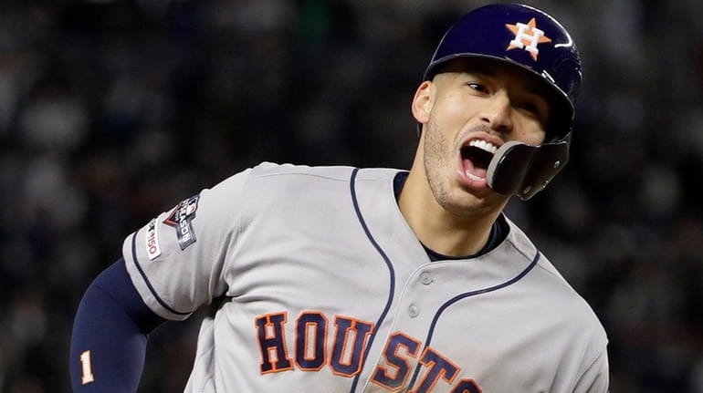 Free agent shortstop Carlos Correa signed on March 19, 2022, to...