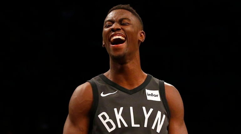 The Nets' Caris LeVert reacts after a basket during a...