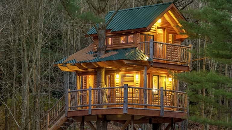 This two-story treehouse is one of the spaces available for...