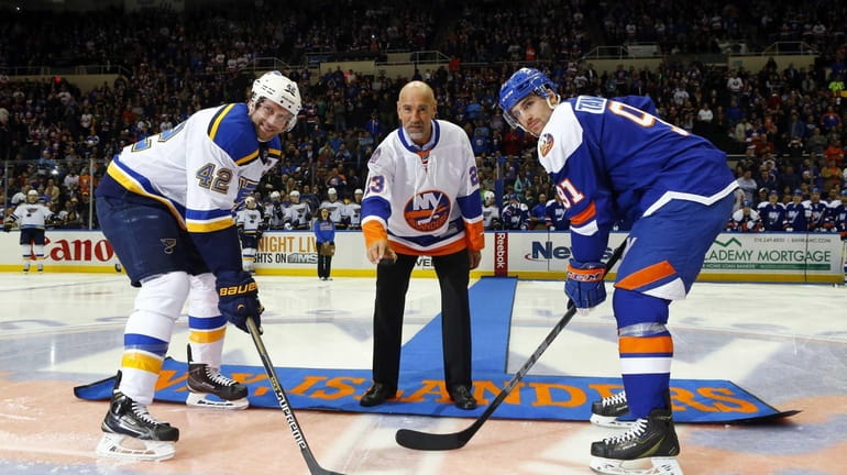 Former New York Islander Bobby Nystrom drops the ceremonial first...