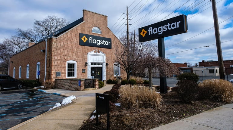 New Flagstar signs have been installed at a former Roslyn...