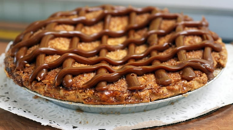 Caramel topped apple pie at Torta Fina Bake Shoppe in...