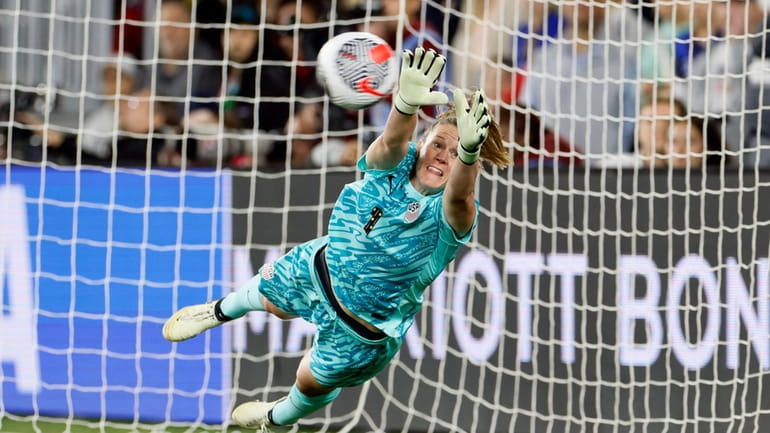 United States' Alyssa Naeher makes a save against Canada during...