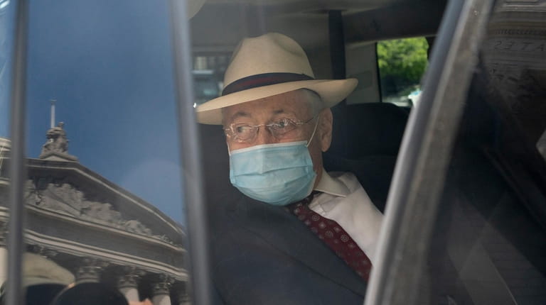 Former Assembly Speaker Sheldon Silver enters a vehicle outside a...