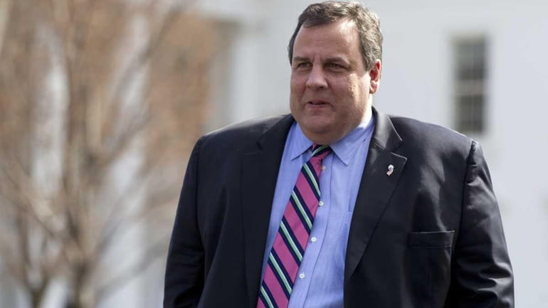 New Jersey Governor Chris Christie leaves the White House in...