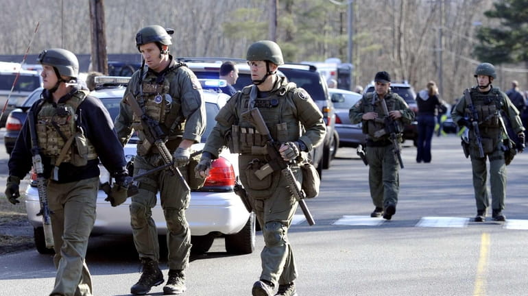 Connecticut State Police respond to the mass shooting at Sandy...