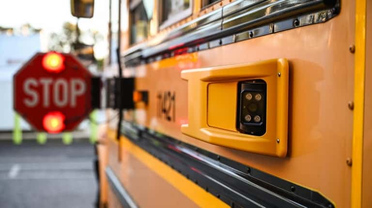 A camera attached to a school bus in a company...