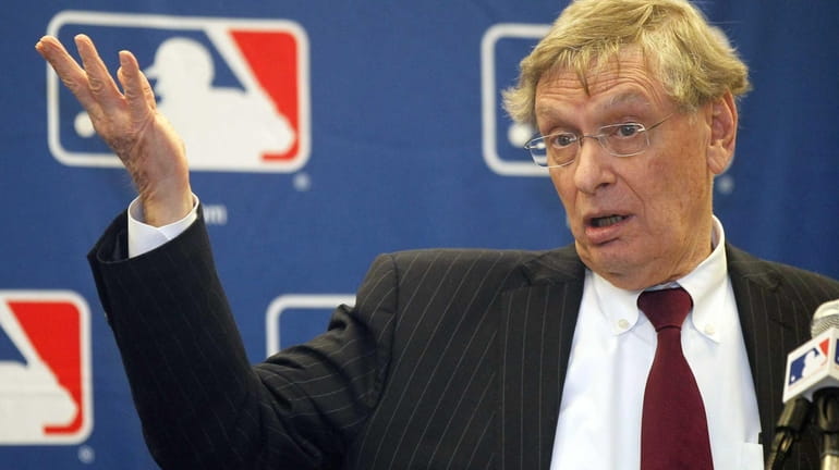 MLB Commissioner Bud Selig talks to reporters after a meeting...