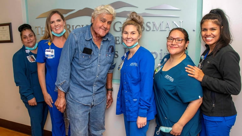 Jay Leno poses with staffers of the Grossman Burn Center...