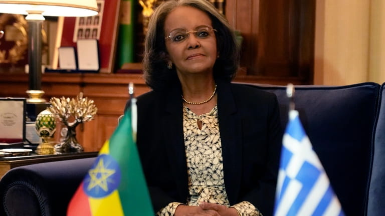 President of Ethiopia Sahle-Work Zewdein poses for the media before...