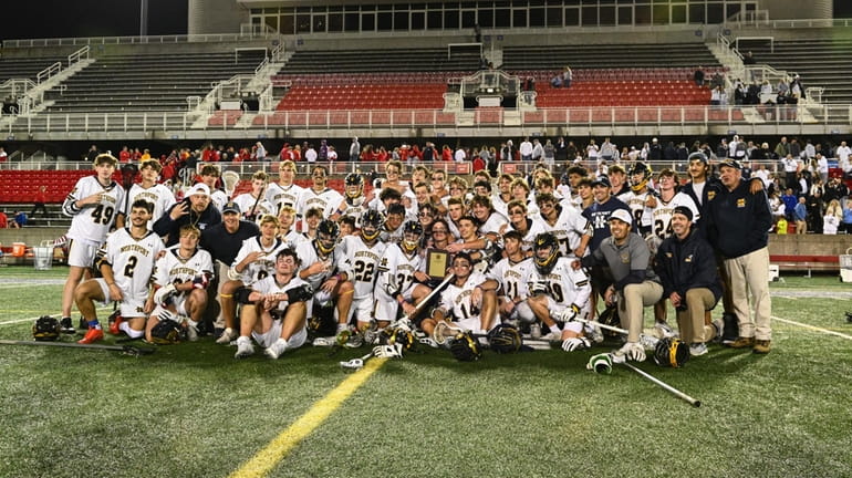 The Northport team celebrates their Class A victory at the...