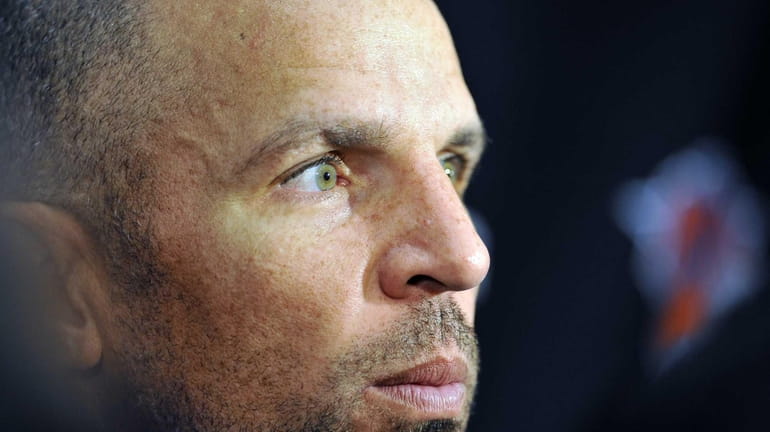 Jason Kidd of the Knicks talks to reporters at the...