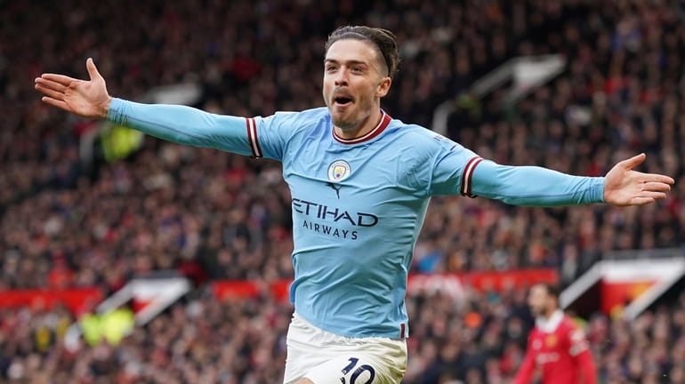 Manchester City's Jack Grealish celebrates after scoring his side's first...