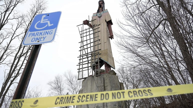 Police tape surrounds the Skowhegan Indian statue in Skowhegan, Maine...