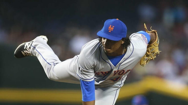 Starting pitcher Jenrry Mejia of the Mets pitches against the...