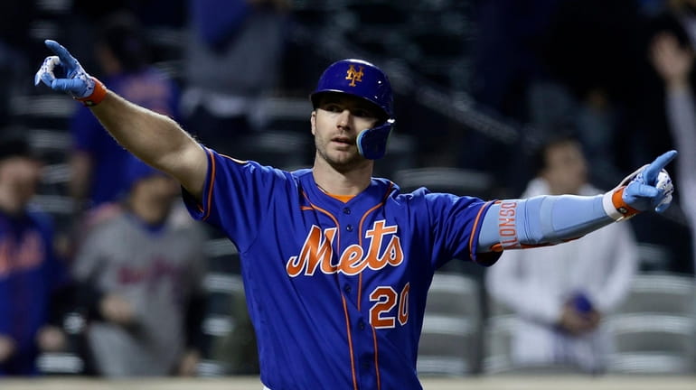 Pete Alonso #20 of the Mets celebrates his 10th-inning game-winning three-run...