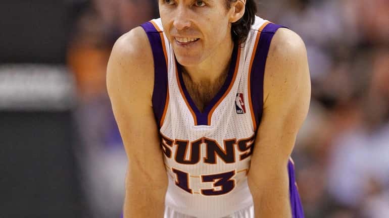 Phoenix Suns' Steve Nash watches a free throw against the...