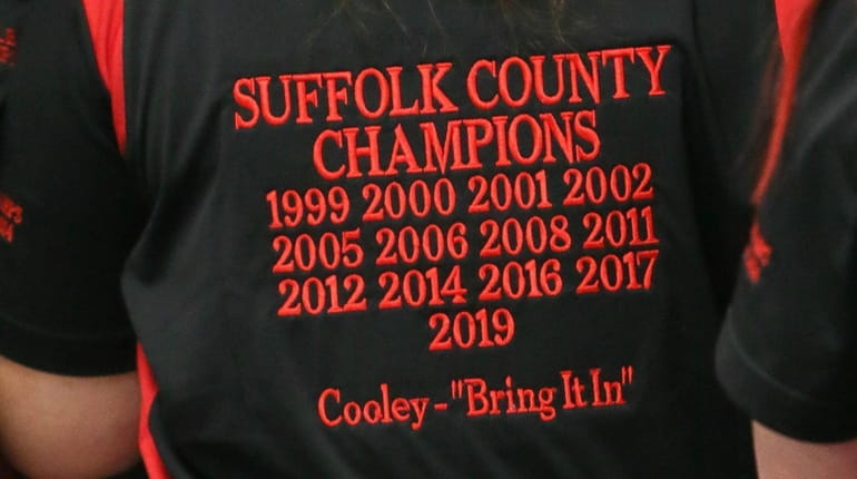 An East Islip bowler wears a shirt in honor of Harold...