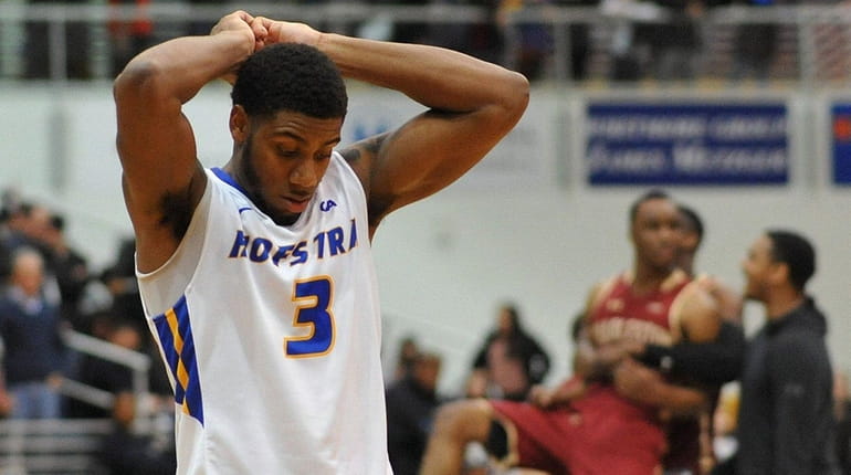 Justin Wright-Foreman of Hofstra reacts after a heartbreaking 86-85 loss...