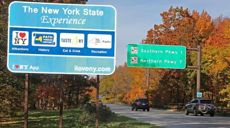 The controversial blue New York State tourism signs on the...