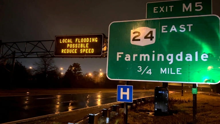 A sign on the Meadowbrook Parkway in Farmingdale alerts drivers...