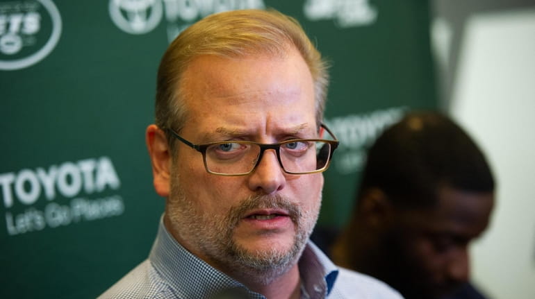 Jets general manager Mike Maccagnan speaks to the press at...