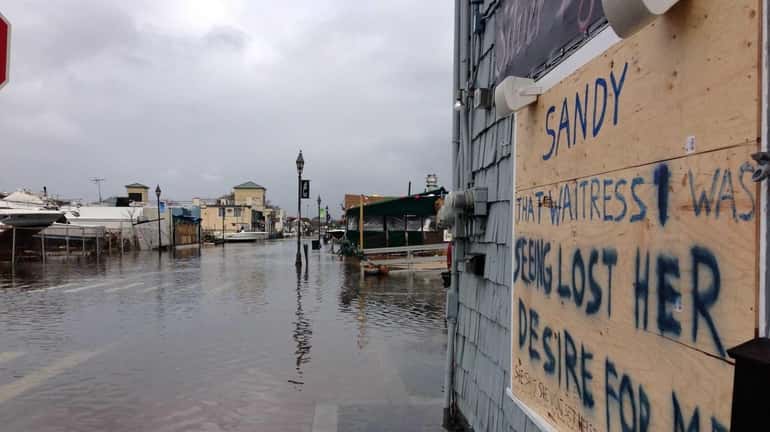 Superstorm Sandy devastated the Nautical Mile in Freeport damaging businesses...