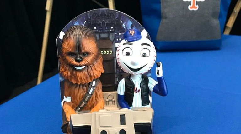 This bobblehead of Mr. Met as Han Solo alongside Chewbacca...