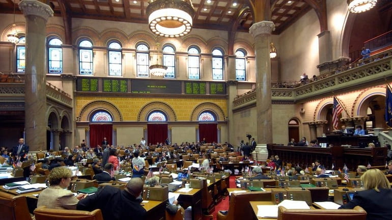 Members of the New York state Assembly hold a session...