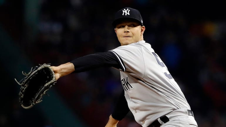 New York Yankees starting pitcher Sonny Gray delivers to a...