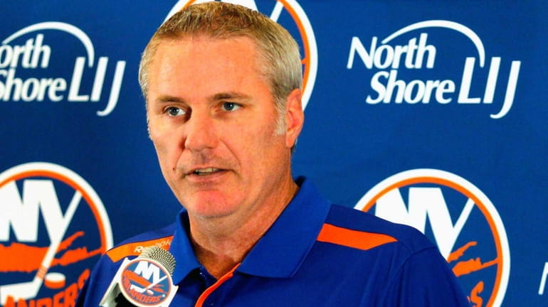 Islanders general manager Garth Snow addresses the media during a...