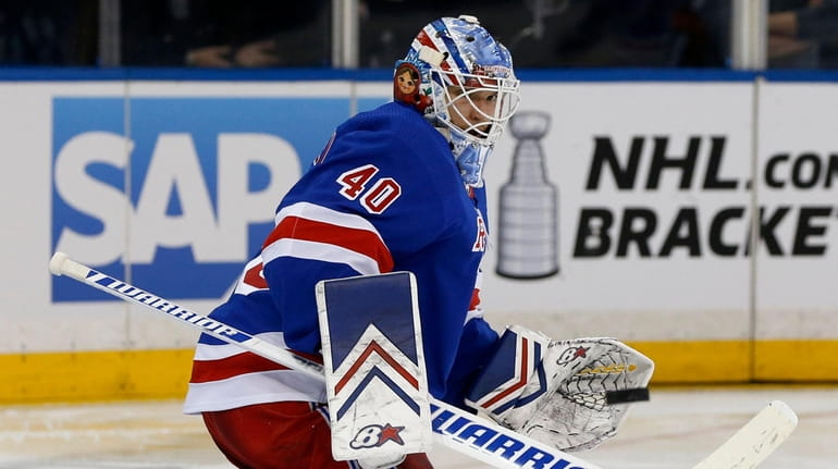 Alexandar Georgiev of the Rangers makes a save during the second period...