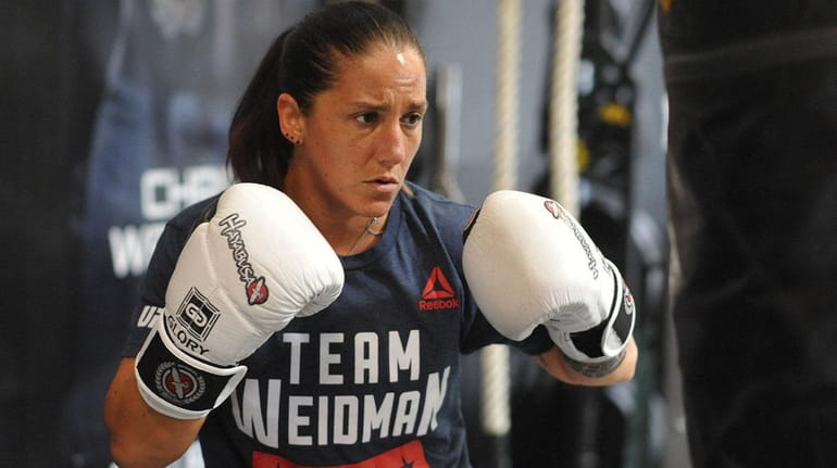 Female mixed martial arts fighter Jennie Nedell trains at Longo-Weidman...