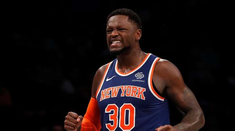 Julius Randle #30 of the Knicks reacts after a play...