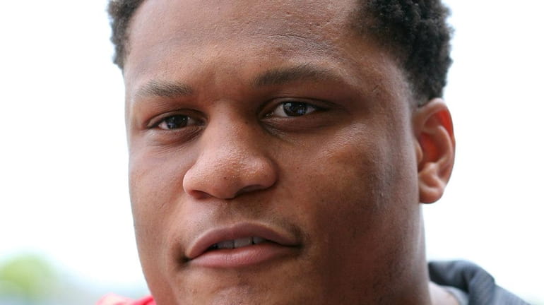 New York Giants offensive tackle Ereck Flowers talks to reporters...