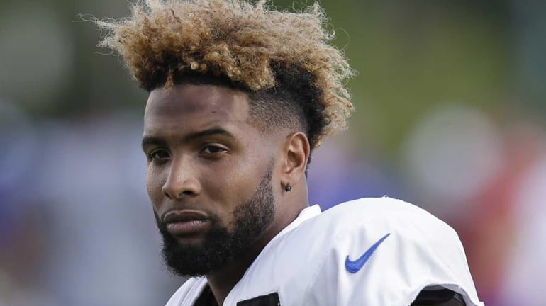 New York Giants wide receiver Odell Beckham Jr. turns to...