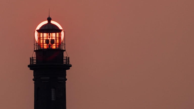 The Fire Island Lighthouse on Thursday during sunrise.