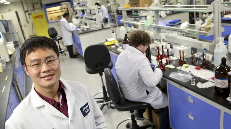 Jianshi "Josh" Yang is shown at the laboratory at Allegiant...