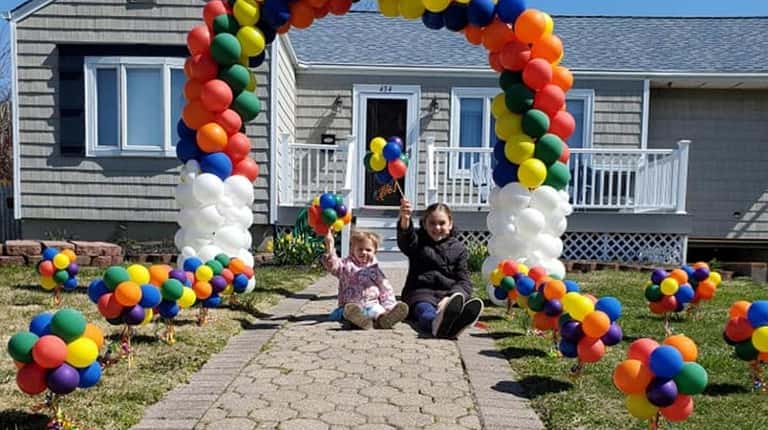 Alivia Canedo, 9, and Kennedy Schmidt, 2, joined in on...