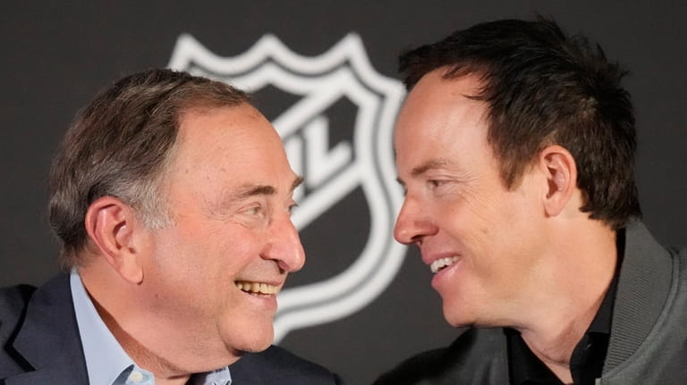 NHL Commissioner Gary Bettman, left, and Ryan Smith, co-founder and...