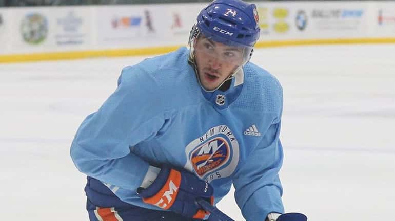 Michael Dal Colle of the Islanders skates during practice at...